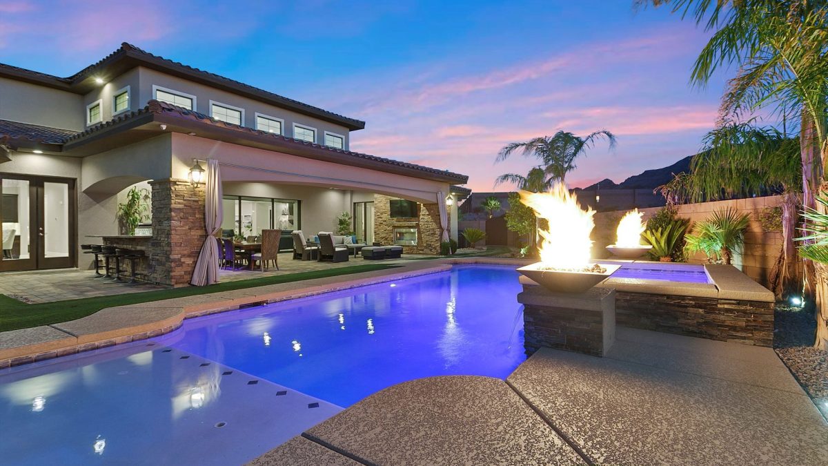 Outdoor pool in glowing in the evening.