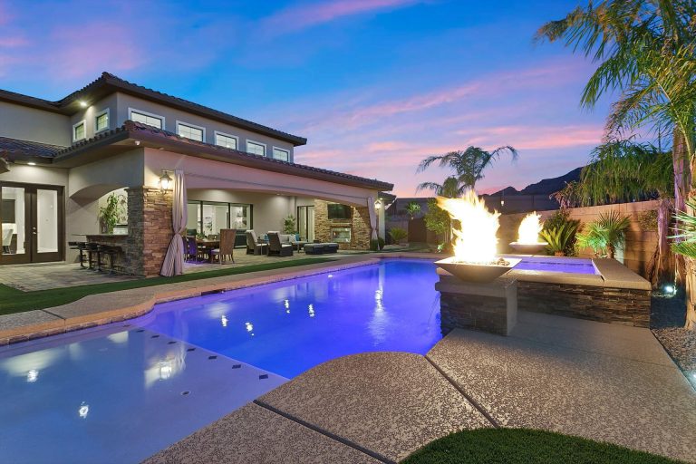Outdoor pool in glowing in the evening.